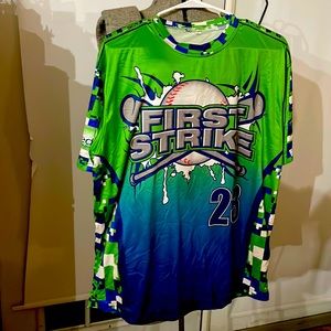 Unfazed Sports Baseball jersey size large.!lots of green in this one. Pre owned